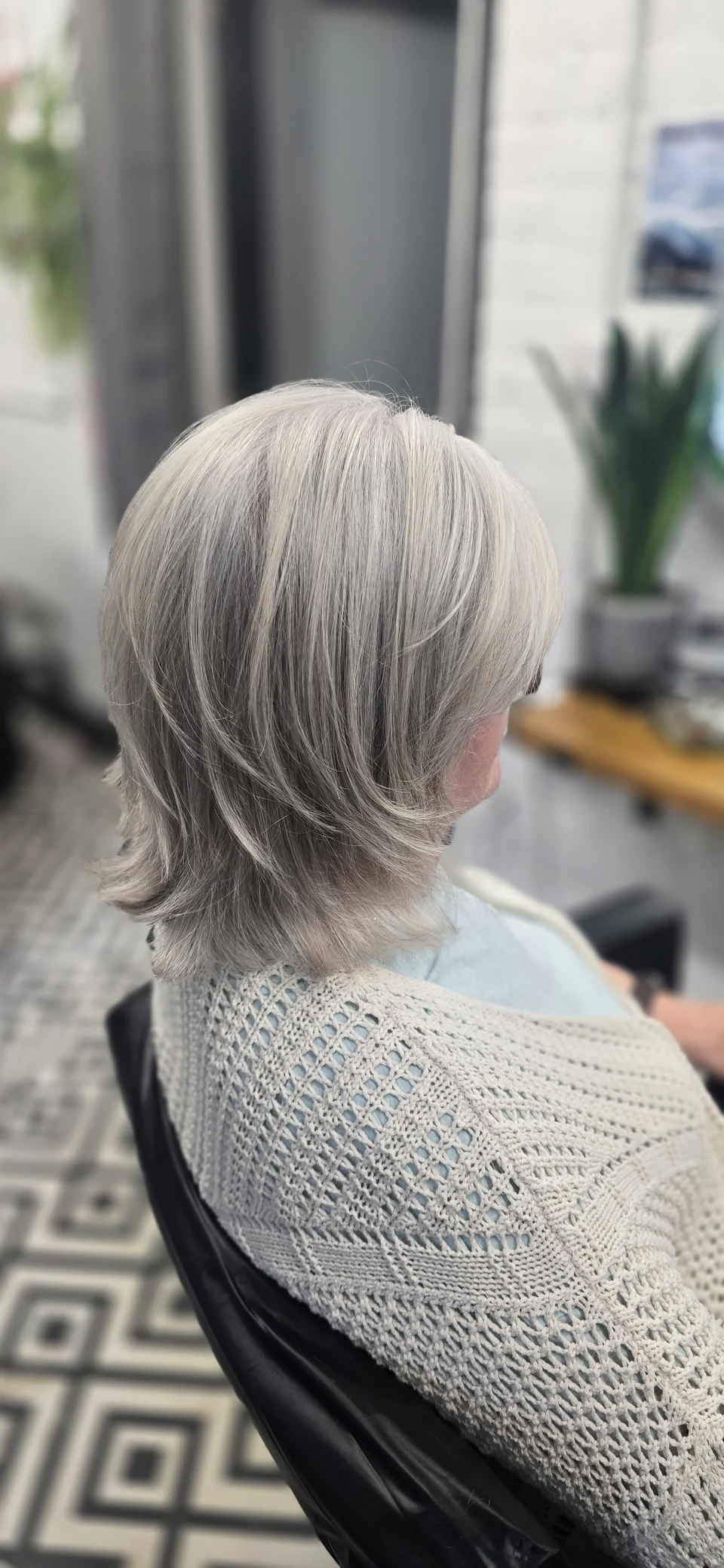 Smooth silver bob with a softly rounded shape