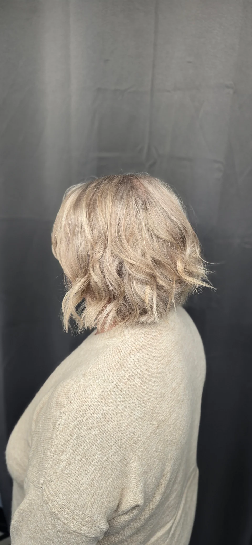 Textured pale blonde bob, viewed from behind